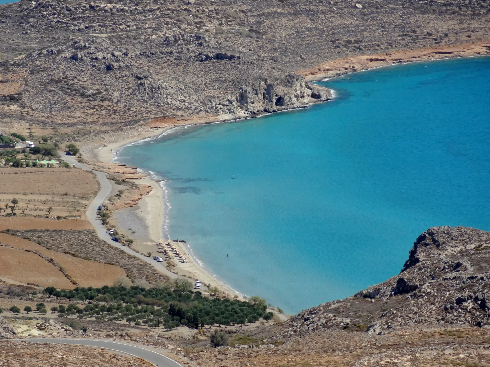 View of Mazida Ammos near Xerokampos with its long bay and arid coastal landscape
